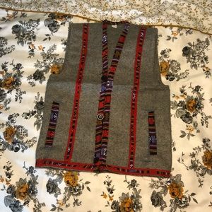 New Woolen sleeveless coat . 1 year old boy size